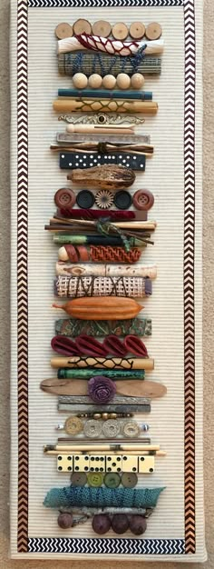 a wall hanging made out of different types of items