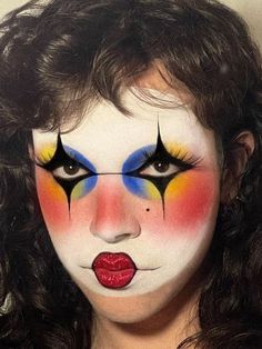 halloween clown makeup: colorful, geometric look 80s Clown Makeup, Salina Killa Clown, Artistic Clown Makeup, Black White And Red Clown Makeup, Beautiful Clown Makeup, 70s Clown Makeup, Abstract Clown Makeup, Drag Inspo Makeup, White Face Clown Makeup