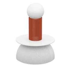 an orange and white object sitting on top of a white plate in front of a white background