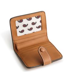 Meet our Small Tab Wallet, the perfect blend of style, functionality and organization offered in a compact silhouette. Crafted from high-quality materials, this wallet offers ample room for your cards, cash, coins and more, keeping everything neatly organized and easily accessible. Whether you're running errands, heading to work or traveling, our wallet offers the perfect combination of functionality, durability and style to meet your everyday carry needs. Vera Bradley Small Tab Wallet in Brown Compact Brown Wallets For Everyday Use, Compact Brown Wallets For Daily Use, Brown Wallet With Zipper Pouch For On-the-go, Brown Leather-lined Wallet For Travel, Brown Leather-lined Wallet Pouch, Fleece Patterns, Vera Bradley Wallet, Checked Luggage, Backpack Lunch Bag