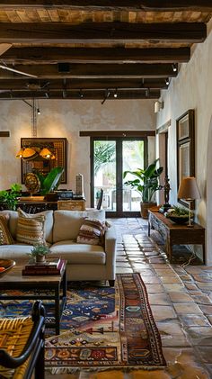 a living room filled with furniture and lots of windows