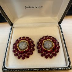 Judith Leiber Brand New Limited Edition Red Enamel Flower Earrings Approximate Measurements: Diameter 1.5” Brand New, Never Worn Luxury Red Ruby Earrings, Red Enamel Clip-on Jewelry, Luxury Red Earrings For Formal Occasions, Designer Red Earrings For Formal Occasions, Red Enamel Earrings For Party, Designer Red Earrings For Gifts, Luxury Red Earrings For Party, Red Clip-on Earrings For Formal Occasions, Designer Red Jewelry For Anniversary