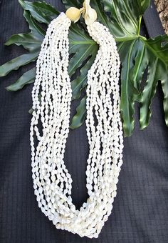 The listing is for 1 lei with 6 strands Nasa shell and  kukui nut on both end. Its length is about 15- 16 inches hanging (32 inches entire strand) If you need more just send me a message and I can do bulk order  100% real shells and kukui nut They are perfect for any hula costumes, weeding accessory, favors, or gift to someone you love. For international Buyer: Please check your country's policies for import duties, taxes and other charges that are nkt included in the item price or shipping charges. These charges are buyer's responsibility and may vary by country. Please be aware to avoid any surprise fee when you receive your package. Thank you for visiting my shop Cheap Bohemian Shell Necklace For Festivals, Cheap Festival Shell Strand Necklace, Hula Costume, Kukui Nut, Bulk Order, Accessories Necklace, Costume Accessories, Lei, Necklace Etsy