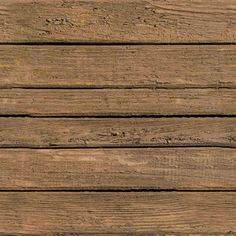 an old wooden plank wall with some grass growing on it