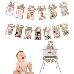 a baby sitting in front of a cake with pictures hanging from it's sides