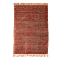 an orange and brown rug with fringes on the bottom, against a white background