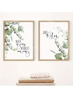 two framed art prints with green leaves on them