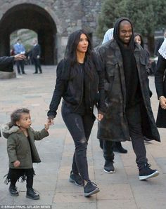 Family time: Kim can be seen holding North's hand while she and Kanye tour Armenia ... Kim Kanye, Estilo Kim Kardashian, Estilo Kardashian, Kim Kardashian Outfits, Kim And Kanye, Kim K Style, Kardashian Outfit, Kim Kardashian And Kanye, Kardashian Family