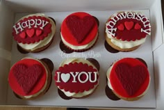 six decorated cupcakes in a box with the words happy anniversary written on them