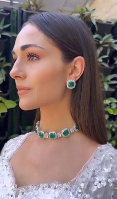 Add a touch of glamour and sophistication with this high quality choker necklace set in beautiful green stones. The stones in this set bling and look close to the real thing. This set is sure to make heads turn!  It features an adjustable necklace and a pair of earrings. It can be paired perfectly with both ethnic and western outfits.  In case of any queries, please feel free to reach out. Happy shopping! Necklace weight- 42gms  Length- 14inches Adjustable length with a metal chain at the back E Green Choker Necklace, Diamond Choker Set, Choker Diamond, Indian Ring, Green Choker, Diamond Necklace Simple, Indian Rings, Raw Silk Lehenga, Ring Ceremony