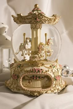 a snow globe with figurines in it