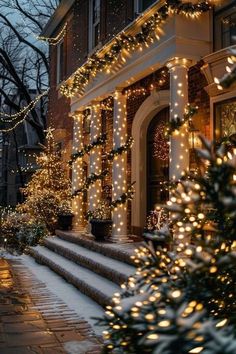 christmas lights on the front steps of a house