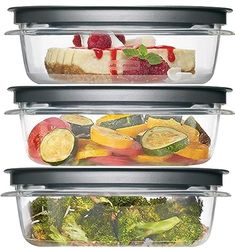 three plastic containers with food in them stacked on top of each other and filled with vegetables