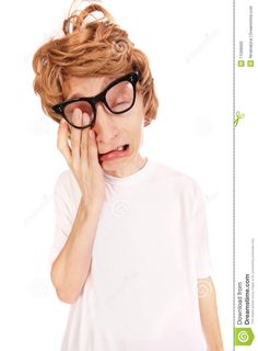 a young boy wearing glasses and making a face with his hands royalty images, clippings