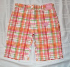 NWT Gymboree Cherry Baby multi-color plaid bermuda shorts with adjustable waistband.  Lots of colors to match many lines... red, green, orange yellow...  Features button and zip fly and front pockets.  I have many matching tops in my ebay store. All items come from a smoke free home. Payment is expected within 7 days.  My shipping and handling fees are free within the U.S. for items in this listing. Cherry Baby, Dream Summer, Capri Shorts, Gingham Shorts, People Clothes, Adjustable Waistband, Plaid Shorts, Pink Plaid, Matching Top