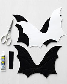 cut out paper bats with scissors and glue