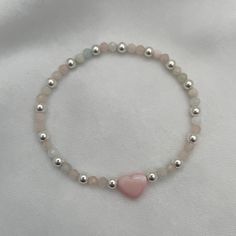 Introducing our Blush Heart and Gemstone Bead Bracelet in radiant sterling silver—a true embodiment of joy and elegance! With its delicate blush heart charm and shimmering gemstone beads, this bracelet is a celebration of love and individuality. Each bead tells a story, reflecting the wearer's unique journey and personality. Whether you're adding a pop of color to your everyday look or stacking it with other treasures, this bracelet is sure to spark joy and conversation wherever you go. Embrace Pink Silver Beaded Bracelet, Puffy Heart Charms, Silver Bead Bracelet, Spark Joy, Gemstone Beaded Bracelets, Puffy Heart, Bracelet Sterling Silver, Pink Bracelet, Matching Bracelets