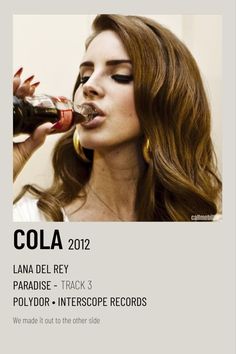 a woman drinking from a coca cola bottle