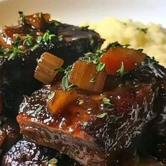 Chef zouheir on Instagram: "Slow Cooker Tender Short Ribs 🍖🍷🥔

Ingredients:

3 pounds beef short ribs
Salt and pepper to taste
2 tablespoons olive oil
1 onion, chopped
4 garlic cloves, minced
1 cup beef broth
1/2 cup red wine (optional)
2 tablespoons tomato paste
1 tablespoon Worcestershire sauce
1 teaspoon dried thyme
1 teaspoon smoked paprika
2 bay leaves
Fresh parsley, chopped (for garnish)

Directions:

1- Season the beef short ribs generously with salt and pepper on all sides.
2- In a large skillet, heat the olive oil over medium-high heat. Sear the short ribs on each side for 2-3 minutes until browned. Remove from heat and set aside.
3- In the same skillet, add the chopped onion and garlic, sautéing for 2-3 minutes until softened.
4- Transfer the short ribs, onion, and garlic to a Ribs Slow Cooker, Lite Meals, Short Ribs Slow Cooker, Dried Thyme, Beef Short Ribs, Slow Cooker Soup, Crockpot Meals, Pot Meals, Bay Leaves