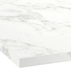 a white marble table top that is very close to the surface with no visible edges