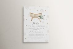 a white and gold christmas party card with a reindeer on it's head, surrounded by snowflakes