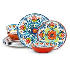 a set of colorful plates and bowls with floral designs