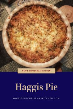 a close up of a pie on a table with the words haggis pie above it