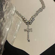 Product Details: Add more flair to your style with this elegant cross pendant necklace. This mock diamond pendant necklace features an elegant design with devotional symbolism. Add this beauty to your collection for a dramatic appeal. Style: Fashion，Trendy Quantity: 1 pcs Material: Alloy, Rhinestones Length：Necklace length 48.5cm, extension chain 8.4cm, cross length 5.6cm Metal Cross Necklace With Clavicle Chain, Elegant Metal Crucifix Cross Necklace, Spiritual Metal Cross Necklace, Metal Cross Pendant Necklace, Silver Cross Necklace With Clavicle Chain, Metal Cross Necklace, Baroque Jewelry, Jewelry 2022, Necklace With Cross