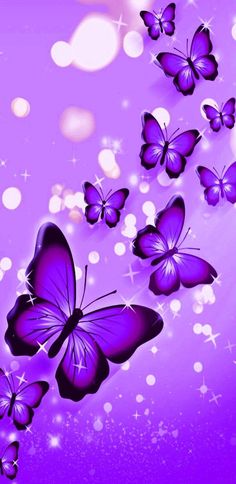 purple butterflies flying in the air with sparkles and stars around them on a purple background