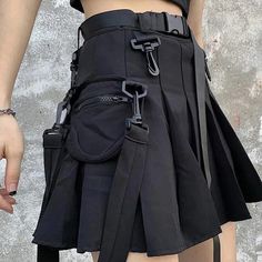 Introducing the Techwear Skirt. This stylish and versatile skirt is perfect for everyday wear or dressing up for a night out. Made from a durable black fabric, it features multiple pockets for holding your essentials, and a high-waisted design that flatters your figure. Whether you're pairing it with a cute top and sneakers or rocking it with a leather jacket and boots, this skirt will make you look and feel your best. So don't miss out, order your Techwear Skirt today! Tech Wear Women, Techwear Skirt, Techwear Women, Goth Skirt, Techwear Outfits, Lace Up Tank Top, Cyberpunk Fashion, Prom Dress Inspiration, Cargo Skirt