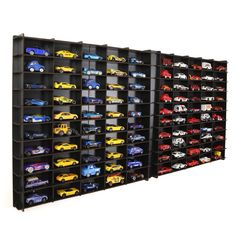 a display case filled with lots of different types of toy cars on it's sides