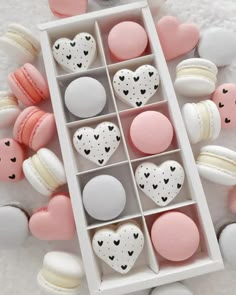 macaroons in a box with hearts on them