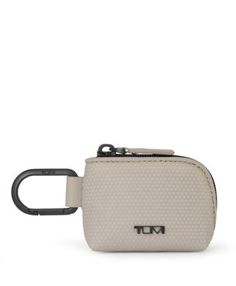 Turn to signature TUMI durability to protect your AirPods Pro. Part of the outdoors-inspired Nomadic capsule, its tactile pattern glows green after charging in the sun or artificial light. Modern Black Luggage Tag For Everyday Use, Tumi Crossbody Bag Women, Tumi Voyageur Backpack, Tumi Luggage, Tumi Bags, Artificial Light, Small Pouch, Travel Products, Small Pouches