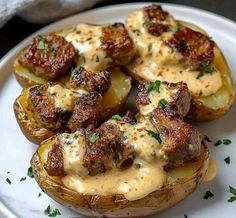 the stuffed potatoes are topped with cheese and meat