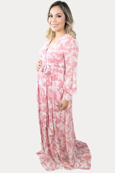 This is the perfect pink floral maternity maxi. Features a gorgeous pink color with a standout white floral print. The sweetheart neckline is perfect for nursing, long loose sleeves, and a tie waistline to keep you comfy! An ideal floral baby shower maxi, date night dress, or just because. Designed for wear throughout all nine months of pregnancy and beyond! Baby Shower Gown, Baby Shower Table Decorations, Baby Shower Wishes, Date Night Dress, Baby Shower Outfit, Pregnancy Months, Maternity Maxi, Loose Sleeves, Perfect Baby Shower