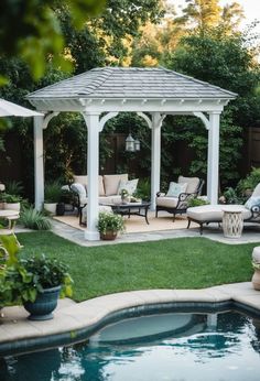 a backyard with a gazebo and lawn furniture next to a swimming pool in the foreground