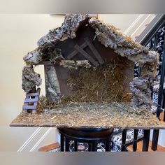 a nativity scene made out of hay and rocks