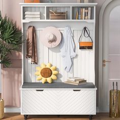 a white bench with a sunflower and hat on it next to a book shelf