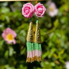 Nootka Rose ANISHINAABE BIMISHIMO Jingle Earrings Media Nootka Rose, Indigenous Fashion, Ritual Dance, Jingle Dress, Native American Beadwork Patterns, Medicine Man, Womens Activewear Tops, Native American Beadwork, Fashion Tops Blouse