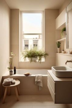 a bath room with a tub a sink and a window