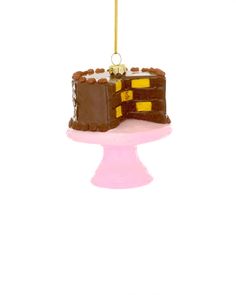 glass chocolate cake ornament with yellow and brown checkered inside on a pink cake stand Pretty Pink Cake, Checkered Cake, Pink Cake Stand, Baking Skills, Cody Foster, Chocolate Icing, Cake Decorating Supplies, Cake Frosting, Pink Cake