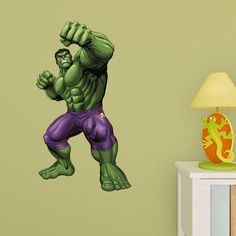 the incredible hulk wall decal is shown in purple and green colors, as well as an orange lamp