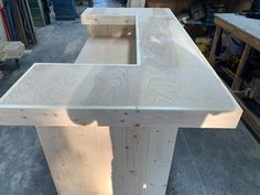 the unfinished table is ready to be built into its own size and shape for display