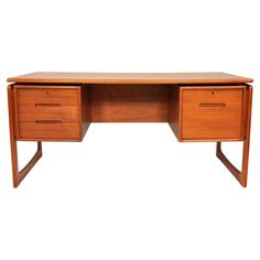 a wooden desk with two drawers on one side and an open drawer on the other