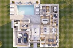 an aerial view of a house with two cars parked in the driveway and three pools