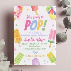 an ice cream themed birthday party with pops and gummy bears on the front, surrounded by greenery