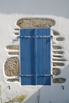 the blue shutters are open to let in light