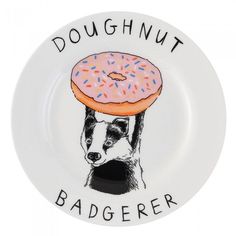 a white plate with a dog wearing a donut on it's head and the words doughnut badgerer