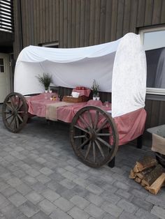 an old wagon is set up for a picnic