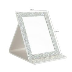 a white stand with a mirror on it and measurements for the top half of it